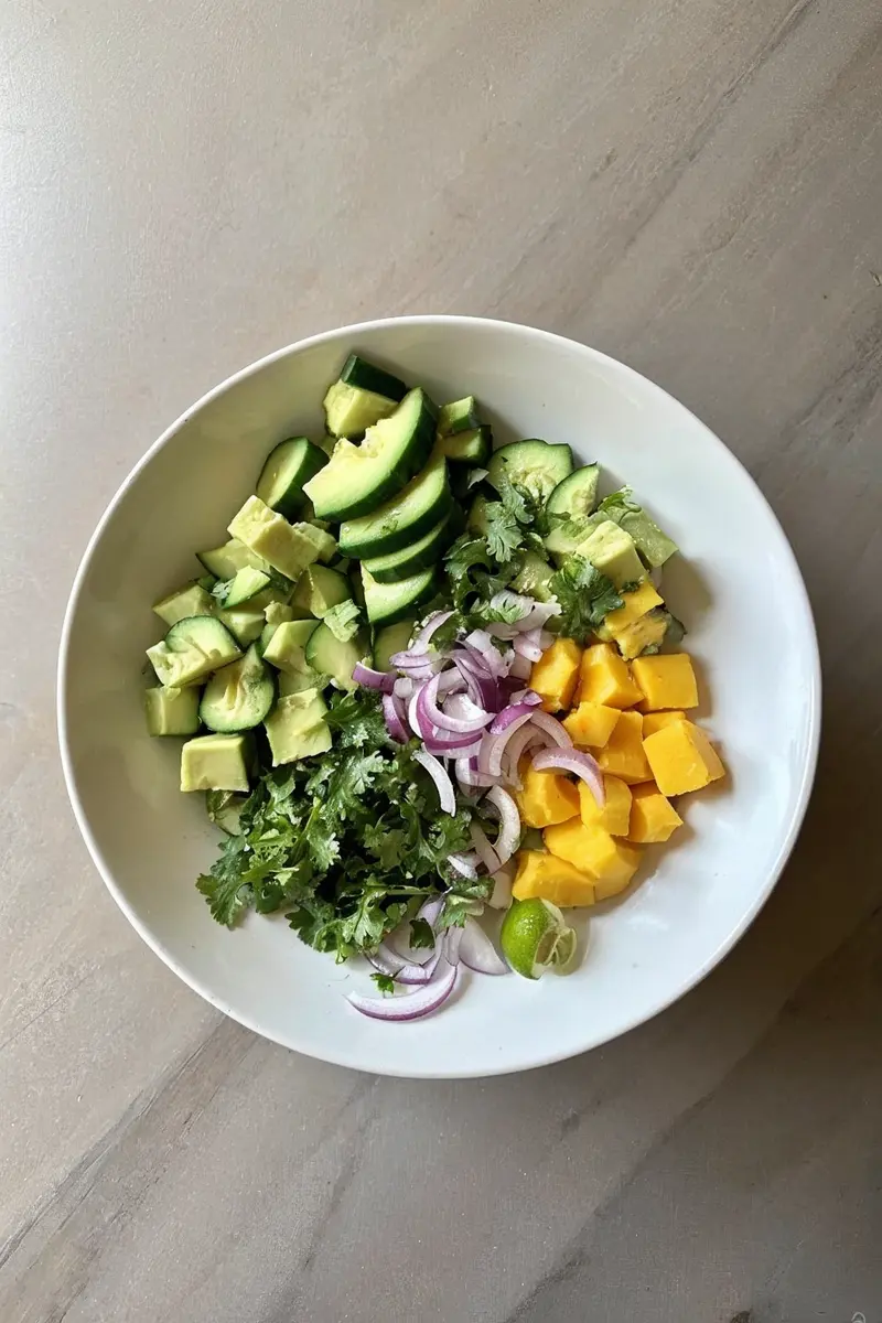 Cucumber Mango Avocado Salad bowl Cucumber Mango Avocado Salad